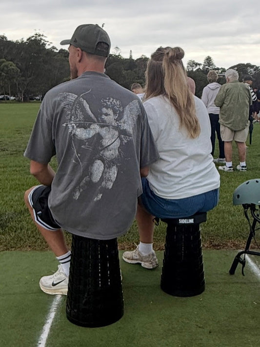 Sideline XL and Mini Luxe stools set up on the sideline at junior sport