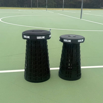 SIDELINE XL and Mini Luxe stools side by side on a sports field